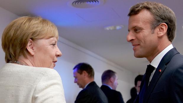 Angela Merkel y Emmanuel Macron, canciller alemana y presidente francés, antes de la cumbre del último Consejo Europeo